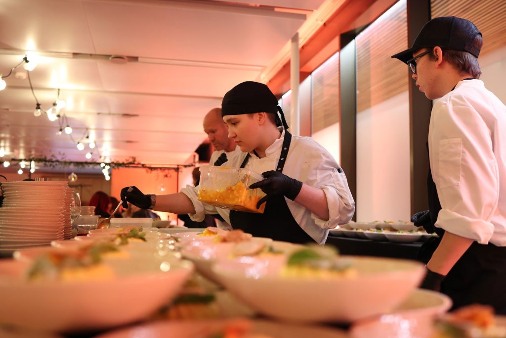 students plating dishes