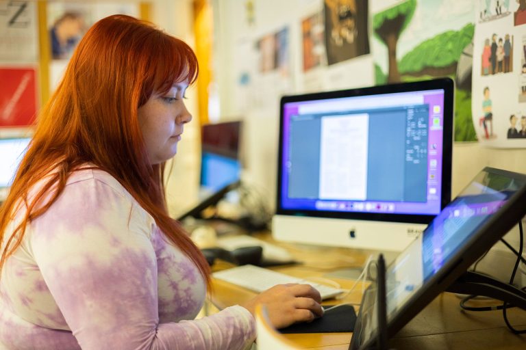 student working on a computer